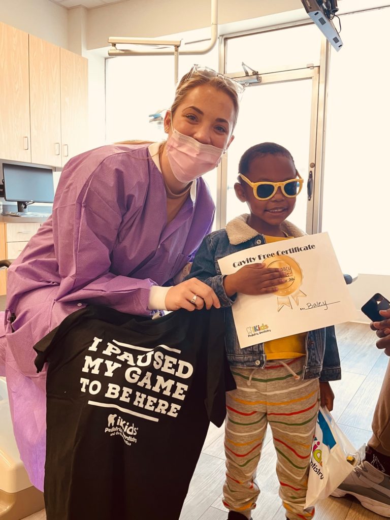 pediatric dentist in Lakewood TX with a patient