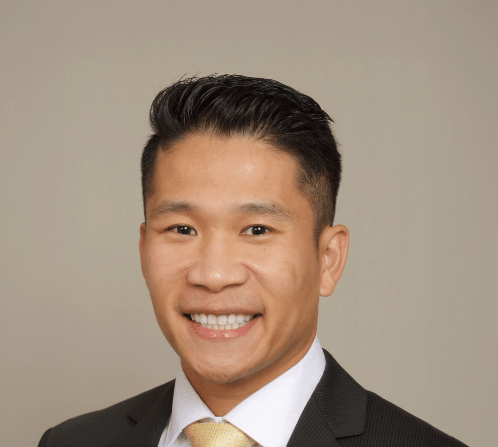Portrait of Dr. Dean Phan, DDS, PharmD, MSD, a pediatric dentist with iKids serving the Dallas-Fort Worth area